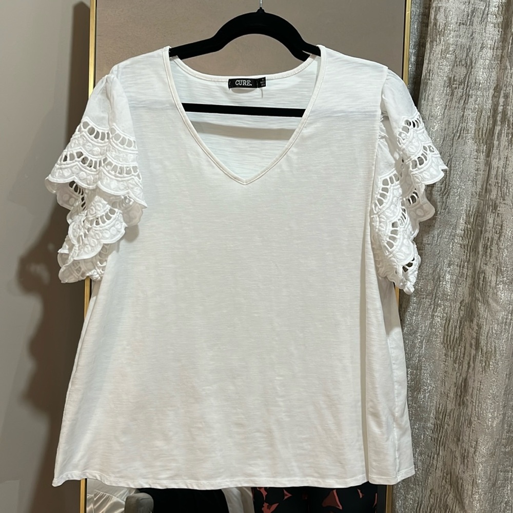 CURE. Women’s Off White Heather Top